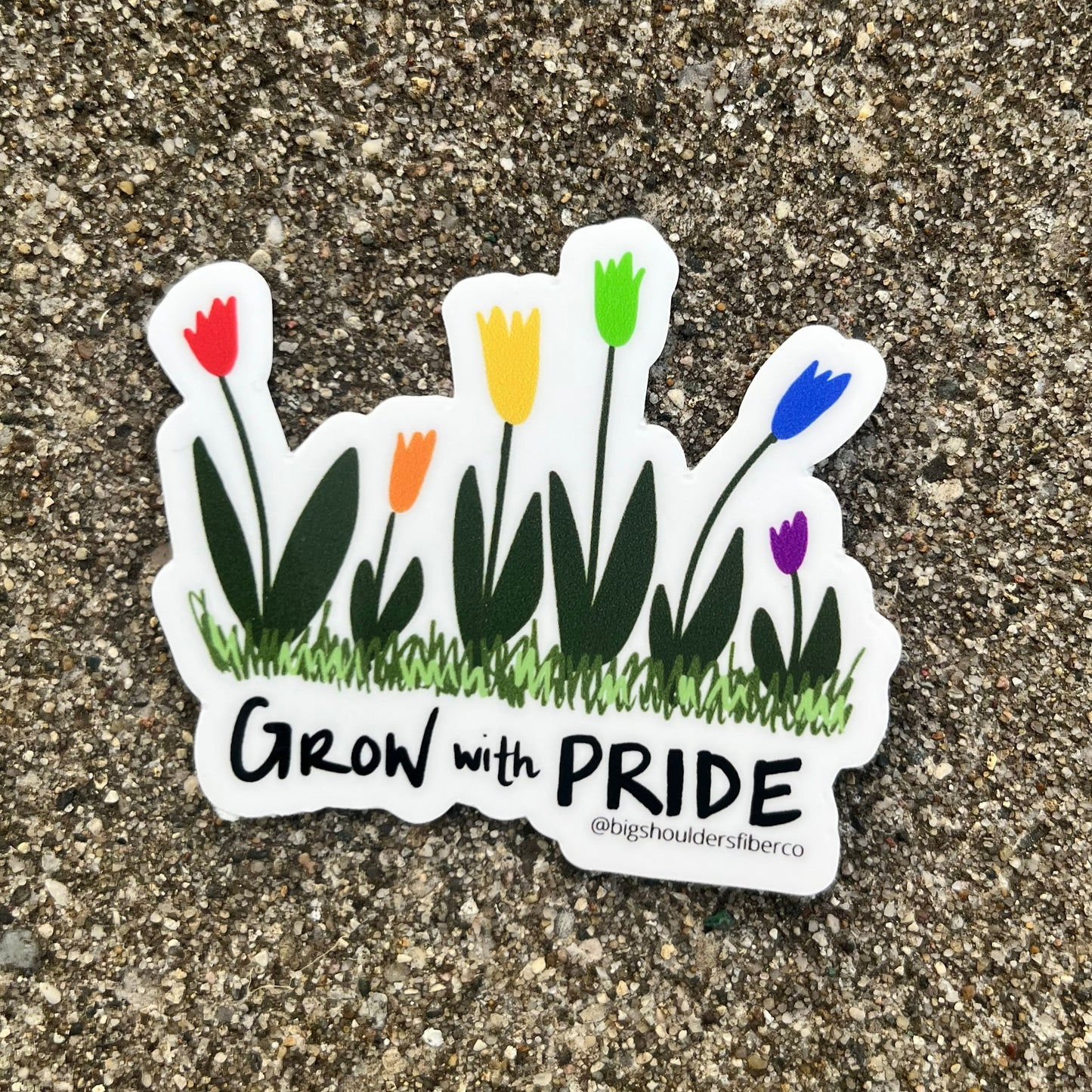 Sticker with tulips in rainbow colors and "Grow with Pride" underneath